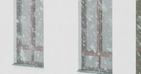 Winter city background. windows of a residential building during a snowfall Stock Footage 149932353