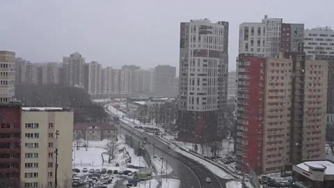 Winter city landscape with falling snow Stock Footage 160552324