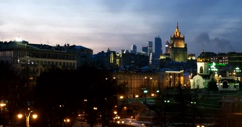 Winter in the city, the lights light up in the dark, interwoven in the pattern Stock Footage 67392341