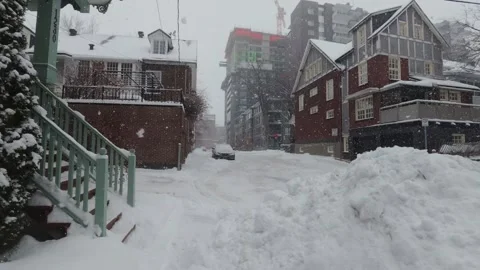 Winter City Walk With Dense Snowfall and Quiet Streets Stock Footage 323424250