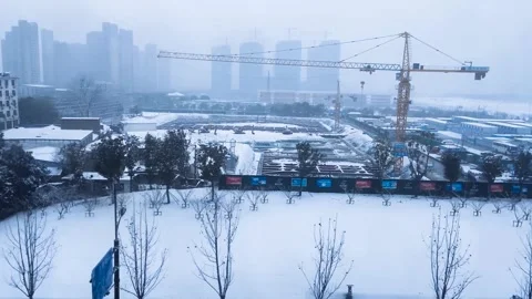Winter Cityscape from Train Window During Heavy Snowfall Stock Footage 341958068