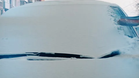 Winter. Cleaning The Car From The Snow Stock Footage 102885726