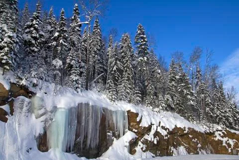 Winter cliff Stock Photos