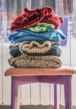 Winter clothes stacked Stock Photos