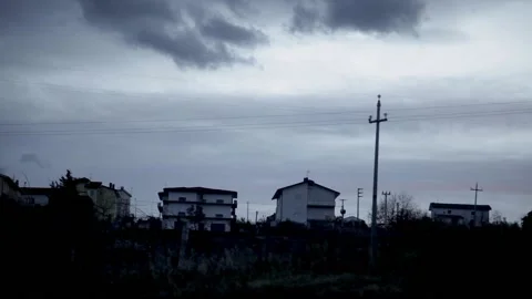 Winter Clouds pre-storm on houses in an Italian town Stock-Footage 160171159