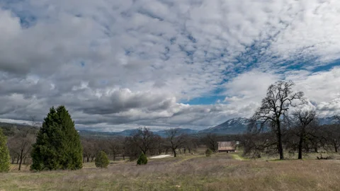 Winter Cloudscape with Barn Timelapse Stock Footage 283258903