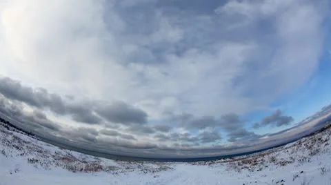 Winter cloudy, windy weather in the mountains with fisheye view (Time Lapse) Stock Footage 10704175