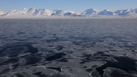 Winter coastal landscape with floating ice fragments Stock Footage 86877518