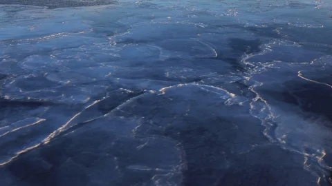 Winter coastal landscape with floating ice fragments 스톡 동영상 86877763
