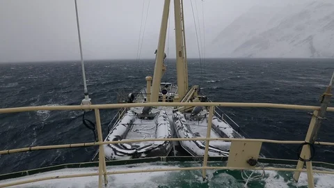 Winter coastal landscape with floating ice fragments from the boat. Stock Footage 86877939