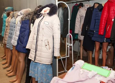 Winter Collection Of Different Coloured Jackets Dressed In Mannequins For Sal Stock Photos