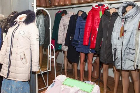 Winter Collection Of Different Coloured Jackets Dressed In Mannequins For Sal Stock Photos