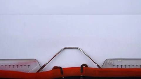 Winter is coming - phrase printed on an old typewriter in red letters, close up. Stock Footage 126777647