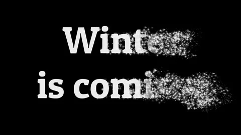 Winter is coming text dissolving into snowflakes Stock Footage 124264654