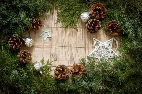 Winter composition with branches of juniper and thuja and Christmas toys on a Stock-Fotos