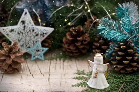 Winter composition with branches of juniper and thuja and Christmas toys on a Stock Photos