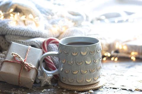 Winter composition with a cup of cocoa and decorative details. Stock Photos
