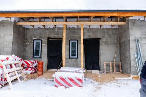 Winter Construction Site with Partially Built Concrete Structure Stock Photos