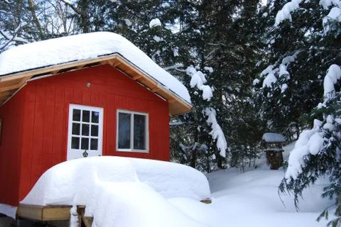 Winter cottage Stock Photos