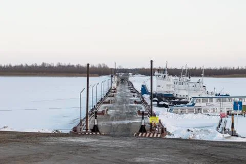 Winter crossing the river. Stock Photos