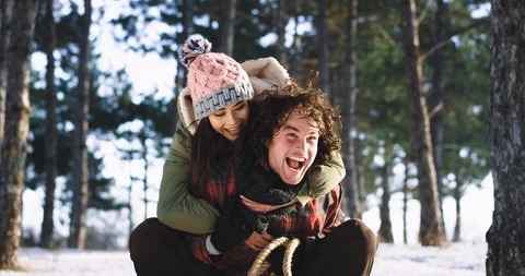 In a winter day in front of the camera a man and a woman very attractive Video stock 111973079