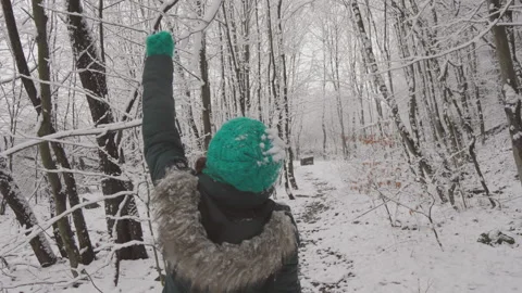 A winter day is full of warmth and joy when a woman feels the richness of nature Video stock 246869967