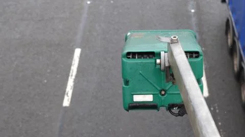 Winter day view average speed traffic camera under falling snow over UK Motorway Stock-Fotos