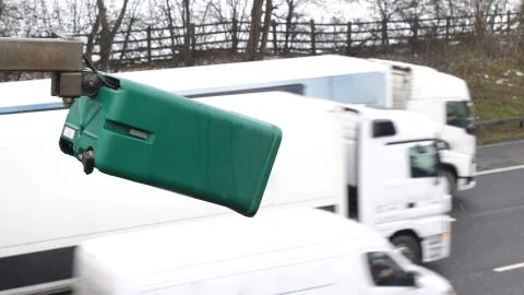 Winter day view average speed traffic camera under falling snow over UK Motorway Fotos de archivo