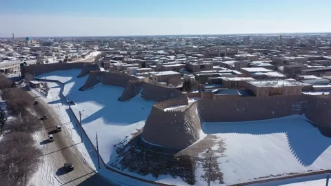 Winter Daylight Drone View over Snow-Covered Rooftops of Khiva Stock Footage 345814537