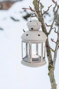 Winter Deco Lantern on snow background Stock Photos