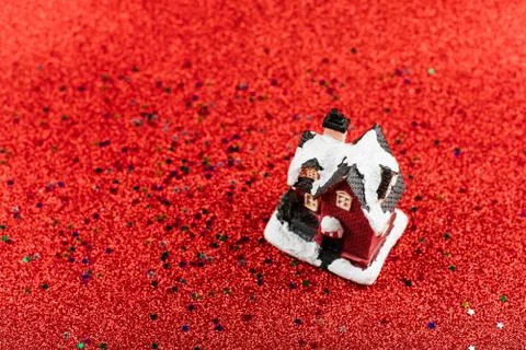 Winter decorative composition with small house and glitter Stock Photos