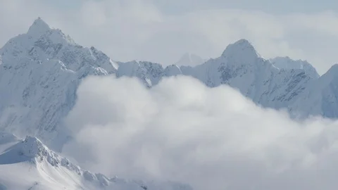 Winter deep snow mountains in cloudy weather during day time Stock Footage 121575734