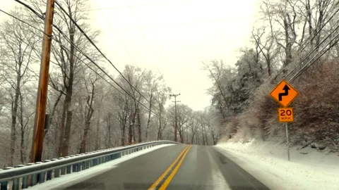 Winter diving along a winding road in Winter Stock Footage 170775445