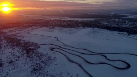 Winter drift racing track at sunset Stock Footage 104129229