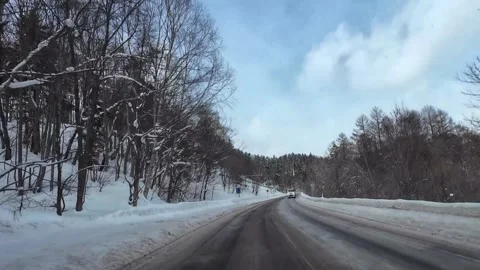 Winter Drive POV Passing White Van on Snowy Road in Furano Hokkaido Japan Vídeo Stock 333696885
