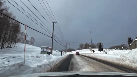 Winter driving to Moai Statue with bus stop tourists Hokkaido Vídeos de archivo 333205055