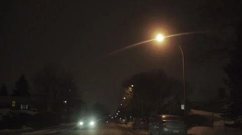 Winter Driving At Night Neighborhood POV Stock Footage