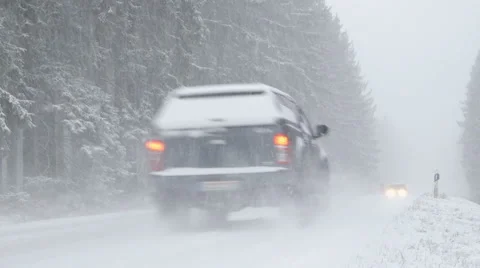 Winter Driving - Snowfall on a Snowy Mountain Road at Dusk Stock-Footage 54700360