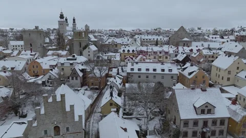 Winter Drone Flight Across Visby Old Town Ruins and Cathedral Stock Footage 330028352