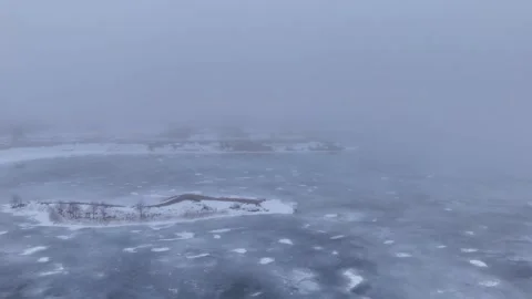 Winter Drone Flight Over Frozen Quarry in Northern Europe Covered by Fog Stock Footage 340328672