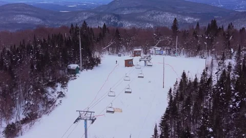 Winter Drone Overview of Canadian Mountain Ski Operations Stock Footage 328619594