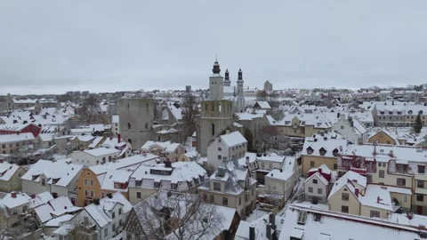 Winter Drone Pullback Revealing Visby Old Town and Almedalen Stock Footage 330027729