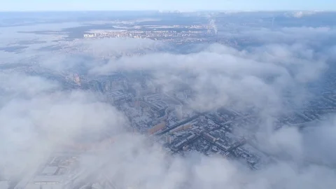 Winter drone shot above the clouds of the Minsk city snow sunny day residential 스톡 동영상 87567966