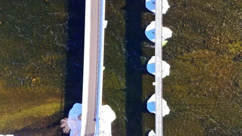 Winter Drone View of Bridge Crossing River in Frankford Ontario Canada Vídeos de archivo 334550839