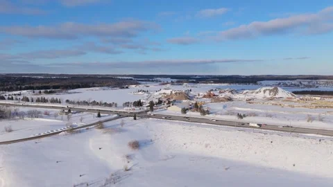 Winter Drone View of Traffic on Highway 10 Near Gravel Pit in Caledon Stock-Footage 328734135