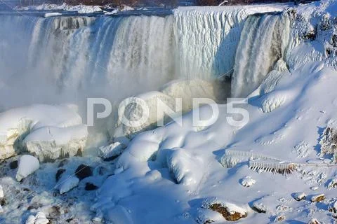 Winter energy ice icicle river spray state falls Stock Photos