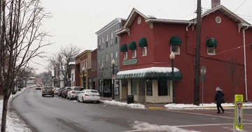 Winter Establishing Shot of Generic Small Town Main Street Storefronts Stock Footage 85635926