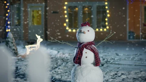 Winter Evening Snowman in Backyard of House Stock Footage 88800783