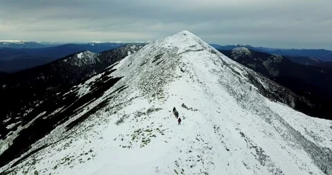Winter Expedition Climbing to the Summit. Stock Footage 252023126