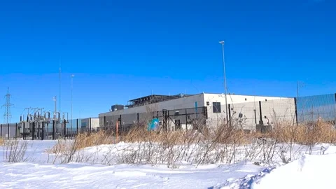 Winter Exterior of Greenergy AI Data Center in Estonia With Security and Power Stock Footage 332402093